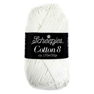 A ball of white yarn with a black label.