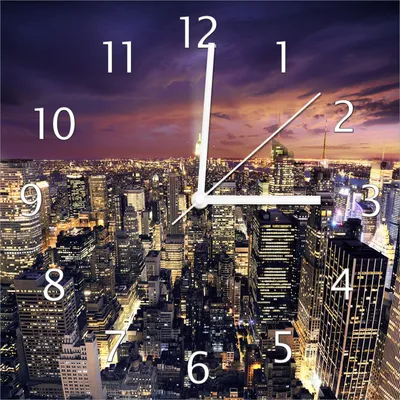 Produktbild von Wallario Design Wanduhr New York bei Nacht - Panoramablick über die Stadt aus Echtglas, Größe 30 x 30 cm