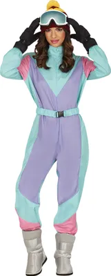 A woman wearing a retro-style ski suit, hat, and goggles, posing against a white background.
