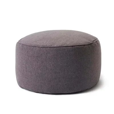 A dark gray fabric pouf is shown against a white background.