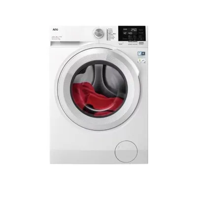A front view of a white washing machine with a red garment inside the drum.