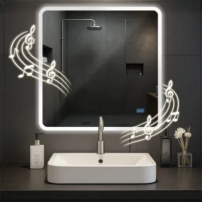 A modern bathroom sink with a mirror above it, featuring decorative musical notes.