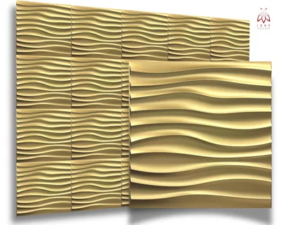 A display of gold-colored 3D wall panels with a wavy pattern.