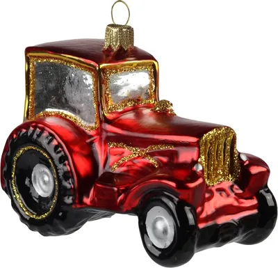 A red tractor Christmas ornament with gold glitter accents.