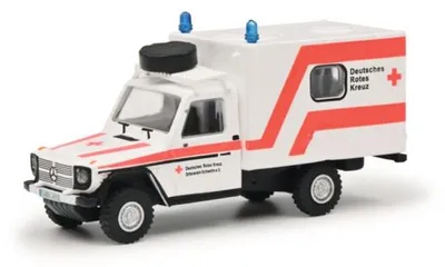 Zdjęcie produktu dla Schuco 452668600 Mercedes Benz G-Class ambulans "DRK" biało-pomarańczowy model samochodu w skali 1:87