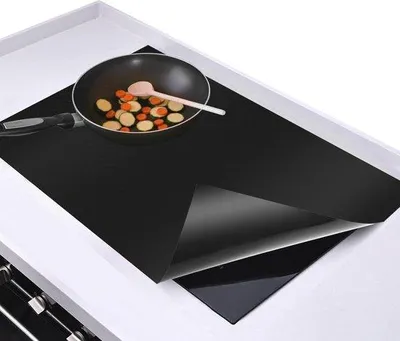 Immagine prodotto di Tappetino antiscivolo in silicone per piani a induzione, 54x90 cm, protezione multifunzionale