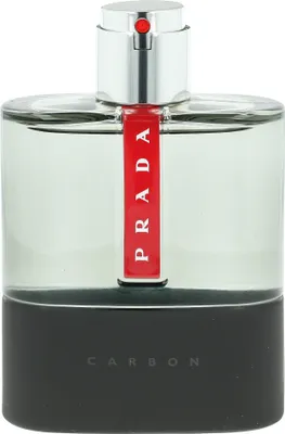 A close-up studio shot of a bottle of Prada Luna Rossa Carbon Eau de Toilette.