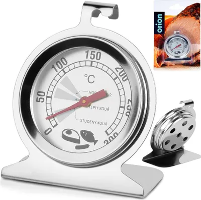A stainless steel oven thermometer with a dial and a stand, shown with a small inset image of the product in its packaging next to a roast.