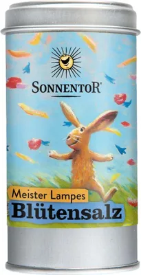 A tin can with a colorful illustration of a rabbit and flowers.