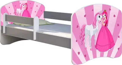 A child's bed with a princess and unicorn theme.