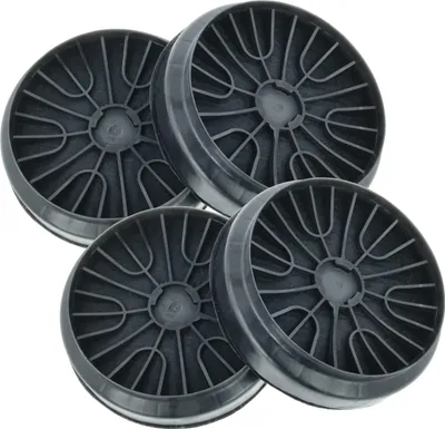 A group of charcoal filters for a range hood.