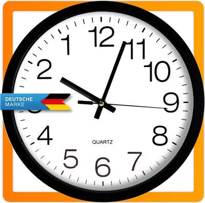 A close-up of a black analog wall clock with a white face and orange border. A blue banner with the German flag and the text "DEUTSCHE MARKE" is overlaid on the left side of the clock.
