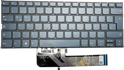 A laptop keyboard and its ribbon cable.