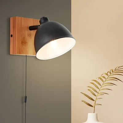 Produktbild von BRILLIANT schwarze Wandleuchte Celia | matt schwarz/bambus | Metall/Bambus | schwenkbarer Kopf | Zugschalter | 1x E14 max. 28 W