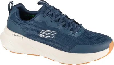 A side view of a blue athletic shoe with a white sole and tan accents.