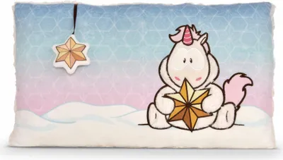 A plush pillow with a cartoon unicorn holding a star, set against a snowy, gradient background.