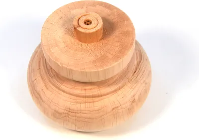 A wooden furniture leg base on a white background.