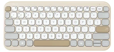 A top-down view of a beige and white wireless keyboard.