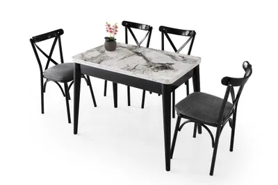 A dining table and four chairs are arranged on a white background.