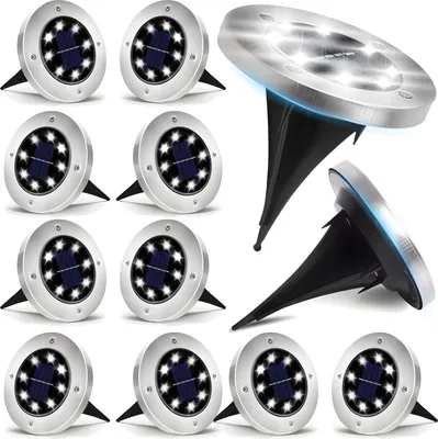 A collection of solar-powered garden lights arranged on a white background, with two lights shown in a more detailed, angled view.