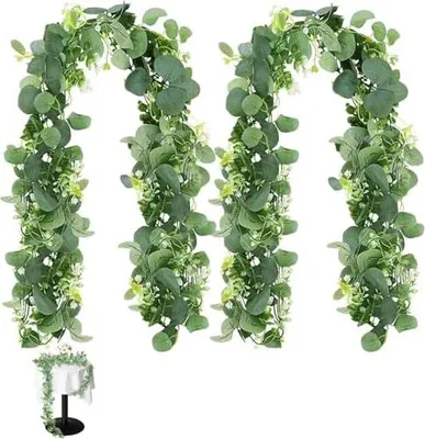 Produktbild von 2 Stück Grün Eukalyptus Girlande Künstlich Kunstpflanzen Eukalyptus Deko 1,8m Hängepflanzen Mit Weiße Blumen Eukalyptusranke Für Hochzeitsbögen, Tischdekoration, Garten & Wohnen