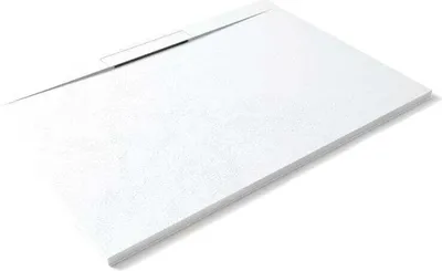 A white, extra-flat shower tray is shown from a slightly elevated angle, with its surface angled towards the viewer. The product is presented on a clean white background.