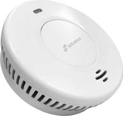 A white smoke detector is shown from a slightly elevated angle against a white background.
