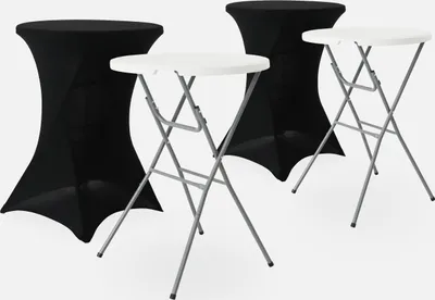 Two black cocktail tables with black covers and two white folding cocktail tables are arranged on a white background.