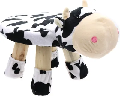 A cow-themed stool for children.