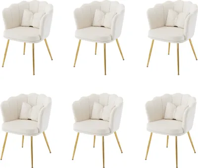 Six cream-colored chairs with gold legs are arranged in two rows of three against a white background.