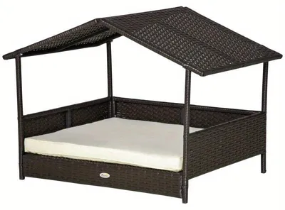 Immagine prodotto di Cuccia per cani resistente alle intemperie, color marrone caffè, realizzata in rattan con una struttura robusta e dimensioni di 98x69x73 cm