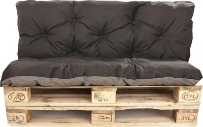 A set of black and gray cushions placed on a wooden pallet, designed to function as outdoor garden furniture.