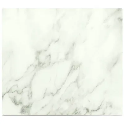 A close-up view of a white marble-patterned surface.