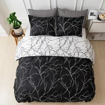 Produktbild von Unyqoos® Luxus-Bettwäsche-Set 220 x 240 cm – Bettbezug + 2 Kissenbezüge 65 x 65 cm, wendbares Schwarz‑Weiß Blättermotiv, Mikrofaser, mit Reißverschluss & Eckbändern