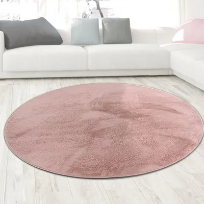 Immagine prodotto di Tappeto in pelliccia di coniglio rosa dall'aspetto elegante e morbido, con raffinato luccichio, dimensioni moderne - 120 cm rotondo