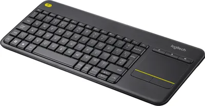 A black wireless keyboard with a built-in trackpad is shown at an angle on a white background.