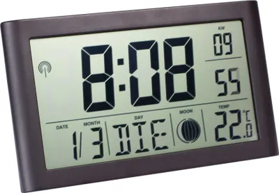 A digital clock displaying time, date, and temperature.