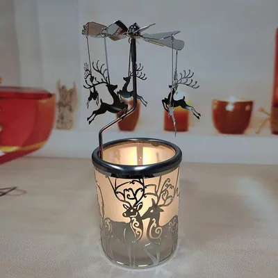 Produktbild von Unyqoos® Rotierender Teelichthalter – Teelicht‑Karussell aus Milchglas & versilbertem Metall, 16,2×5,7 cm, silber, Rentier‑ und Engelsmotive, Weihnachtsdeko & Geschenk