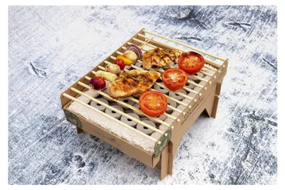 Produktbild von Einweggrill Casus (5 Stück) Ökologischer Einmalgrill für Camping, Strand und Park, 100 % nachhaltig, 50 % weniger CO2 durch Bambuskohle, nach 5 Minuten einsatzbereit und über 1 Stunde nutzbar, absolut rauchfrei
