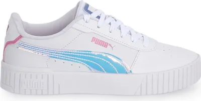A white Puma Carina 2.0 Deep Dive Jr. sneaker with blue and pink accents is shown from the side against a white background.
