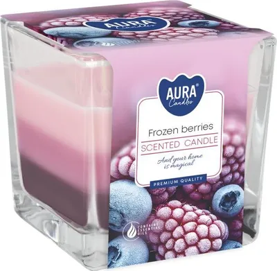 A scented candle in a glass jar with a label featuring frozen berries.