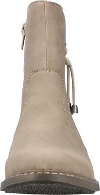 A front view of a beige boot.