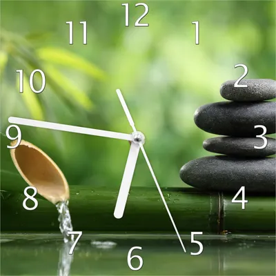 Produktbild von Wallario Design Wanduhr Steinstapel und Bambus auf dem Wasser aus Echtglas, Größe 20 x 20 cm