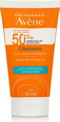 A close-up studio shot of an orange and white tube of Avène Cleanance sunscreen.