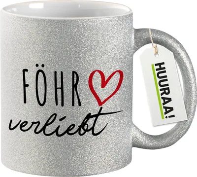 Produktbild von Huuraa Glitzertasse Föhr verliebt 330ml Silber Keramik Kaffeebecher Geschenkidee