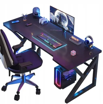 A gaming desk setup with a chair, computer, monitor, keyboard, and accessories.