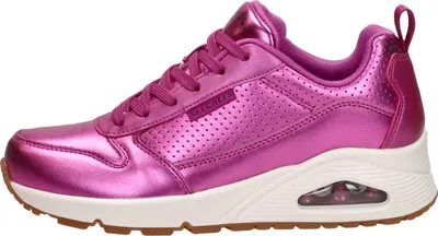 A side view of a single pink Skechers sneaker against a white background.