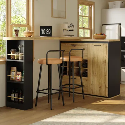 A modern kitchen or dining area with a bar counter, stools, and storage units.