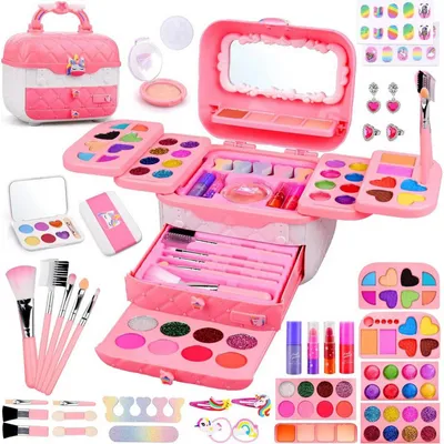 A collection of children's makeup toys arranged on a white background.