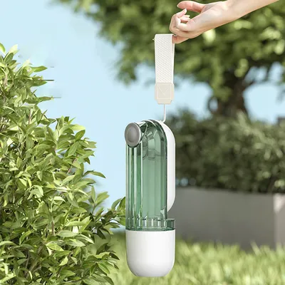 Produktbild von INF Tragbarer Haustier-Wasser- und Futterbecher für den Außenbereich Grün